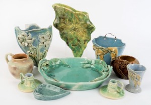 Group of Australian pottery wall pockets, gum leaf dishes, candle holders, etc., (10 items), makers include ERIC BRYCE CARTER, FLORIAN, FLORENZ, M. HOSKINS, etc., the largest 28cm wide