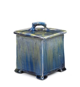 HARVEY SCHOOL blue glazed lidded pottery square form vase with yellow highlights, incised "T.H., 1923", 13cm high