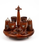 Tasmanian fiddleback blackwood egg cruet set, each piece adorned with silver map of Tasmania, early 20th century, bearing "Shott & Son" circular paper label to base, 19cm high