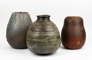 Three Australian studio pottery vases, including a gumnut shaped example, and another by BRUC McWHINNEY, the largest 27cm high