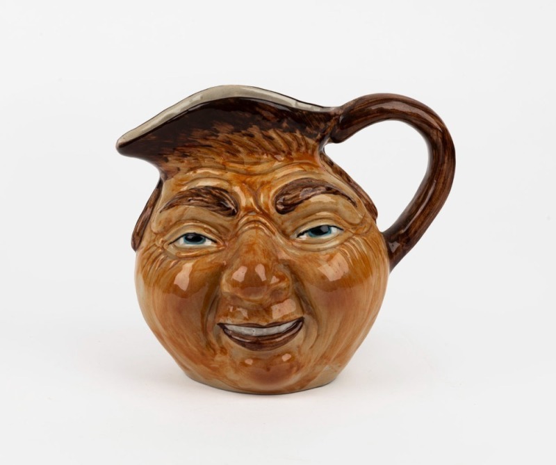 LITHGOW POTTERY face jug in the manner of Martin Brothers, impressed kangaroo mark to base "Lithgow", 15cm high