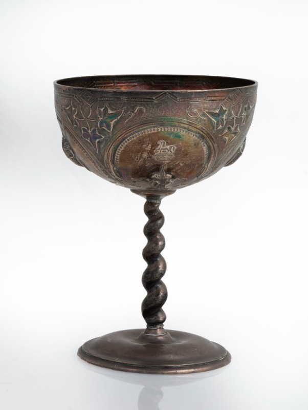 An antique sterling silver goblet with repousse maritime decoration, made in London, circa 1861, stamped on the base "BRUSH AND MACDONNELL, SYDNEY", 13cm high, 176 grams