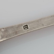 An 18th century CHANNEL ISLANDS silver trefid spoon stamped "I.A." of Jersey, possibly ISAAC d'ARGENT, circa 1710, engraved "T.L.G.", 19cm long, 40 grams  - 2