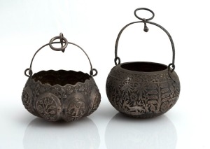 Two antique Eastern silver baskets with repousse and chased decoration, 19th/20th century, the larger 12cm high, 208 grams total