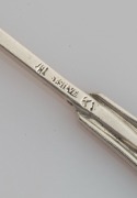 LINTON of Perth set of six Australian silver coffee spoons, two teaspoons, and a pâté knife, all decorated with Western Australian wildflowers, (9 items), stamped "JAL SILVER", the knife 12.5cm long, 100 grams total - 10