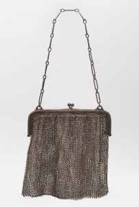 An antique Australian silver mesh purse, 19th/20th century, stamped "M. Bros. 925", with pictorial marks (illegible), 26cm high including chain, 134 grams