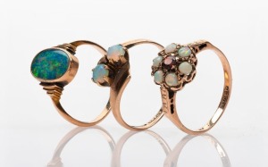 Three antique gold and opal rings including an example by JOSEPH LAWRENCE of Melbourne, 19th/20th century, 5.9 grams total