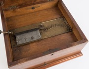 An antique polyphon music player in walnut case with floral marquetry top, late 19th century, 18cm high, 40cm wide, 36cm deep - 3
