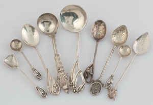 Nine assorted Australian silver spoons with wildflower motifs, mostly Western Australian makers including JAMES LINTON and JOHN HARRIS, the largest 13cm long, 112 grams total