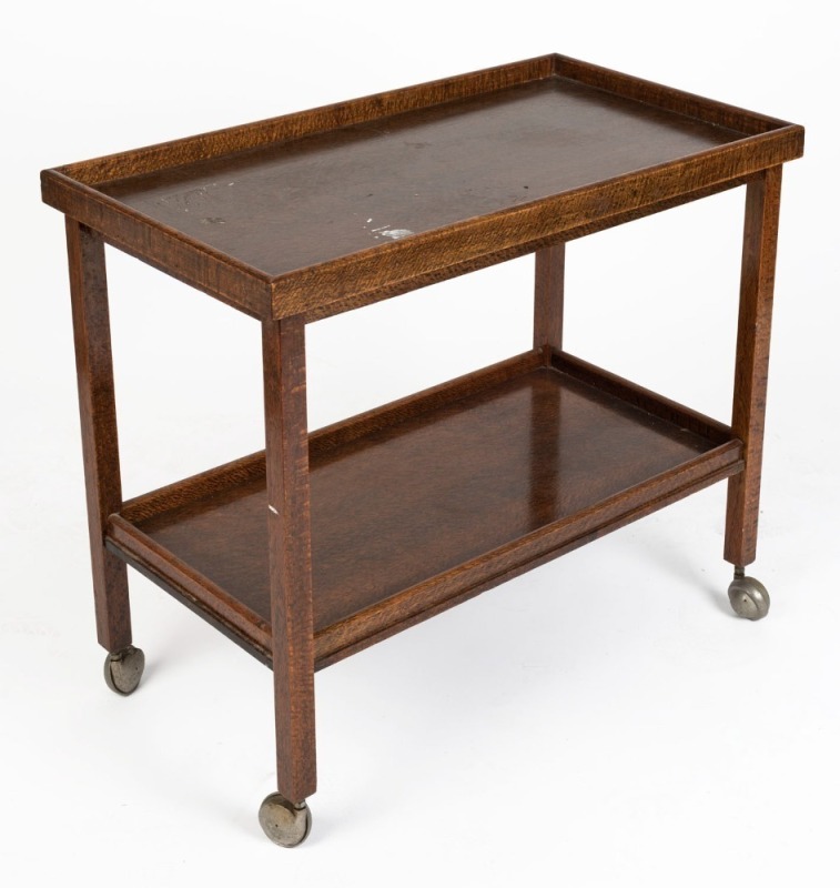 An antique Australian silky oak drinks trolley, early 20th century. ​​​​​​​70cm high, 80cm wide, 44cm deep