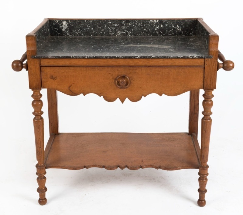 A French oak scullery washstand with black marble top, 19th century, ​​​​​​​77cm high, 89cm wide, 47cm deep