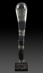 SUE McPHERSON "Waddy" art glass club engraved with Wandjina spirit figures, accompanied by a bespoke gallery stand, engraved "Sue McPherson, 03/10", 43cm high