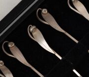 SARGISONS&nbsp;of Hobart, set of six Australian silver spoons with gumnut and leaf decoration, housed in original branded box, stamped "SARGISONS, SILVER", 11cm long, 54 grams total - 2