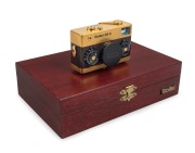 FRANKE & HEIDECKE: 1979 Rollei 35S 35mm compact camera. Special edition gold-plated for the 60th anniversary of the Rollei&nbsp;company [#0036/1500]. In addition to being plated in 24-carat gold, the body is covered in lizard skin, bearing a uniquely numbered 