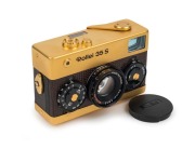 FRANKE & HEIDECKE: 1979 Rollei 35S 35mm compact camera. Special edition gold-plated for the 60th anniversary of the Rollei&nbsp;company [#0036/1500]. In addition to being plated in 24-carat gold, the body is covered in lizard skin, bearing a uniquely numbered - 2