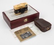 FRANKE & HEIDECKE: 1979 Rollei 35S 35mm compact camera. Special edition gold-plated for the 60th anniversary of the Rollei&nbsp;company [#0036/1500]. In addition to being plated in 24-carat gold, the body is covered in lizard skin, bearing a uniquely numbered - 5