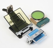 HASSELBLAD: Three camera accessories - one Hasselblad-G 3-50 lens filter sealed in unopened plastic wrapper in maker's box, one yellow TIPRC&nbsp;Sports Finder&nbsp;[#37908 1-2] with rubber eyepiece and 80mm/150mm/250mm markings, and&nbsp;one sports finder with 80mm fra