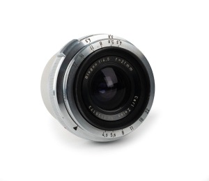 CARL ZEISS: Biogon 21mm f4.5 lens [#1136173] with Contax mount, c. 1954, together with metal rear lens cap.