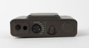 KIEV ARSENAL: Two c. 1985 Kiev 35A compact cameras - one in black with MC Korsar 35mm f2.8 lens and hot shoe cover, and one in dark grey&nbsp;with Kiev-Korsar 35mm f2.8 lens and hot shoe cover. Well-known Soviet copies of the Minox 35GT. (2 cameras) - 5