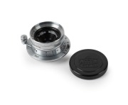 NIPPON KOGAKU: W-Nikkor&middot;C&nbsp;28mm f3.5 lens [#349245]&nbsp;with Leica thread mount in chrome, c. 1954, together with metal front lens cap.