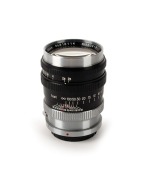 NIPPON KOGAKU: Nikkor-P&middot;C&nbsp;105mm f2.5 lens [#916114]&nbsp;with Nikon-S mount&nbsp;in black and chrome, c. 1959, together with&nbsp;rear lens cap.