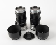 NIPPON KOGAKU: Two black and chrome lenses with bayonet mounts for rangefinder cameras - one c. 1956&nbsp;Nikkor-Q&middot;C&nbsp;135mm f3.5 [#269833]&nbsp;together with lens hood&nbsp;and&nbsp;front and rear&nbsp;caps, and one c. 1960&nbsp;Nikkor-Q&nbsp;135mm f3.5 [#277521] with lens hood. (2 items) - 2