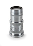 NIPPON KOGAKU: Nikkor-Q&middot;C&nbsp;135mm f4 lens [#611215] for rangefinder cameras,&nbsp;in chrome with bayonet mount, c. 1950. Bears engraving that reads 'Made in Occupied Japan'.