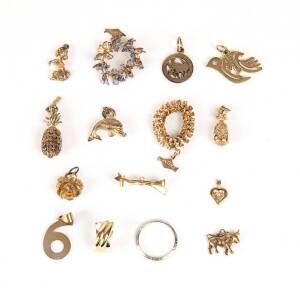 VARIOUS: Gold and gold plated pendants, charms, ring, brooch and earring.