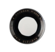 NIPPON KOGAKU: Nikkor-Q&middot;C&nbsp;135mm f4 lens [#611215] for rangefinder cameras,&nbsp;in chrome with bayonet mount, c. 1950. Bears engraving that reads 'Made in Occupied Japan'. - 2