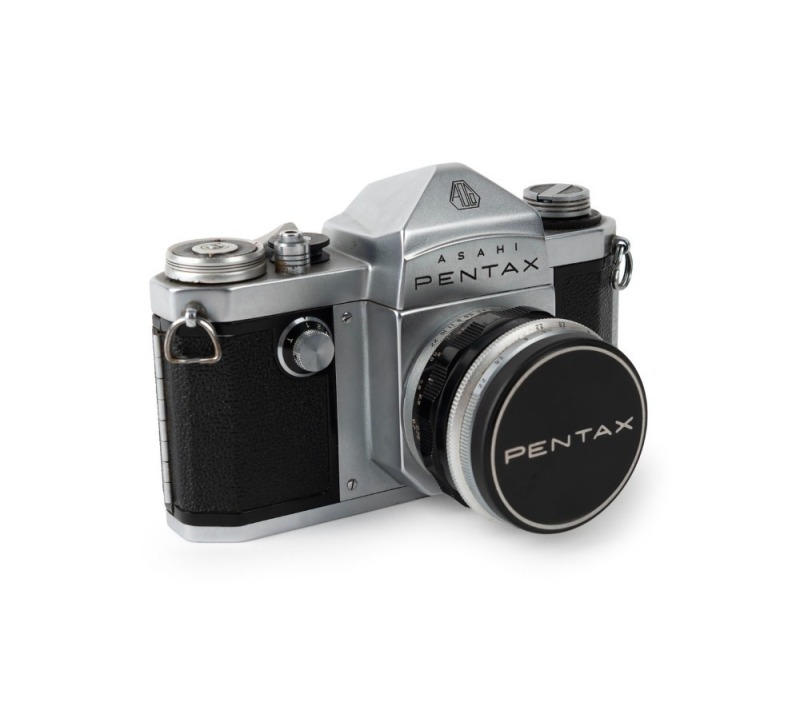 ASAHI KOGAKU: Pentax S SLR camera [#157326], c. 1958, with Takumar 55mm f2.2 lens [#156040], together with metal front lens cap.