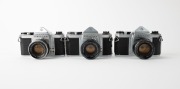 ASAHI KOGAKU: Three early 1960s chrome-body SLR cameras - one Pentax S1 [#527278] with Auto-Takumar 55mm f2.2 lens [#685818], one Pentax S1a [#667626] with Super-Takumar 55mm f2 lens [#1333211], and one Pentax S2 [#394959] with Auto-Takumar 55mm f2 lens [ - 2