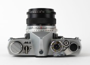 OLYMPUS: 1972 chrome-body Olympus M-1 SLR camera [#135685] with M-System Auto-S 50mm f1.8 lens [#125174]. Very few of these cameras and lenses were produced before name was&nbsp;changed to 'OM-1' to avoid infringing on the Leitz&nbsp;M1 trademark. - 4