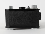 OLYMPUS: Black-body Olympus PM-6 microscope camera [#205480], c. 1954, with shutter release cable and maker's lined wooden box bearing 'Olympus Tokyo' metal stamp. - 3