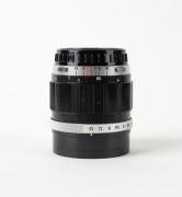 OLYMPUS: G. Zuiko Auto-T 60mm f1.5 lens [#103217],&nbsp;in black and chrome, with bayonet mount for Olympus Pen F, together with front and rear lens caps. - 3