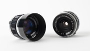 OLYMPUS: Two c. 1963 black-and-chrome lenses in Pen F bayonet mount - one G. Zuiko Auto-S 40mm f1.4 [#178622] with front cap and lens hood, and one E. Zuiko Auto-W 25mm f4 [#123048] with front cap. (2 items) - 2