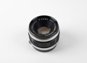 OLYMPUS: Two black and chrome lenses in Pen F bayonet mounts - one Zuiko Auto-Zoom&nbsp;50-90mm f3.5 [#128959] in maker's box with front and rear caps, lens hood, leather case, and printed matter, together with one F. Zuiko Auto-S 38mm f1.8 [#226008] with fron - 2