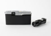 OLYMPUS: Pen FT half-frame SLR camera [#292237], c. 1966, with G. Zuiko Auto-S 40mm f1.4 lens [#165272], T-45 metal lens hood, and Pen-F straight magnifier viewfinder attachment. - 3