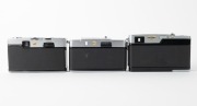 OLYMPUS: Three c. 1967 35mm half-frame cameras - one Pen-EM [#105763] with F. Zuiko 35mm f2 lens and Olympus 82C lens filter, one Pen Rapid-EE S [#100335] with D. Zuiko 30mm f2.8 lens and Olympus lens hood, and one Pen-EED [#251516] with F. Zuiko 32mm f1. - 3