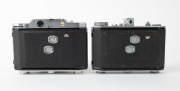 OLYMPUS: Two vertical-folding cameras - one 1948 Chrome Six I [#22296] with Zuiko 75mm f3.5 lens [#35225] and Copal shutter, and one 1955 Chrome Six Va&nbsp;[#172624] with D. Zuiko 75mm f3.5 lens [#140869] and Copal shutter. (2 cameras) - 3