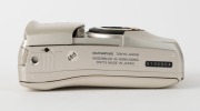 OLYMPUS: Mju Zoom 105 Deluxe L compact camera [#5796964] with gold body and lens detail, c. 1995,&nbsp;with Zoom 38-105mm lens, in maker's box with leatherette pouch, RC-200 remote control, wrist strap, and instruction booklet. - 5