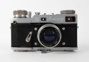 GOMZ: Circa 1964 Leningrad coupled rangefinder camera [#001854], four-screw variant, with Jupiter-8 50mm f2 lens [#5945497]. - 2