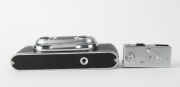 WIRGIN: Two unusual c. 1950s black-and-chrome&nbsp;cameras - one Wirgin Stereo camera with dual Cassar 35mm f3.5 lenses [#1032111 & #1034098], and one Edixa 16-S subminiature camera with Xenar 25mm f2.8 lens. (2 cameras) - 5