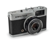 OLYMPUS: 1985 Olympus Trip 35 compact camera [#5453231], in chrome, with D. Zuiko 40mm f2.8 lens. On receipt of this camera, Michael's Camera Video & Digital were informed by the manufacturer that this example was the final Trip 35 ever to be produced, wi