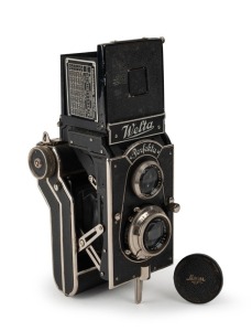 WELTA: Perfekta TLR camera featuring unusual folding body, c. 1934, with Trioplan 75mm f3.5 lens [#744548] and Compur-Rapid shutter, together with lens cap.