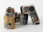 CANON: Transparent-body Canon EOS 650, c. 1987, with EF Zoom 35-105mm f3.5-4.5 lens, 420EZ battery-operated flash unit [#F055E], and rubber eyepiece attachment. Intended as a sales aid to illustrate the advantages of the EOS 650 to potential buyers. - 5