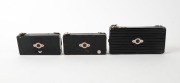 HOUGHTON: Three black strut-folding cameras - one pre-1911 Ensignette No. 1 with 'N-sign' engraving, one post-1911 Ensignette No. 1 with embossed patent details and flag logo, and one Ensignette No. 2 D De Luxe, with&nbsp;Aldis-Plano Anastigmat f6.5 lens. (3 c - 3