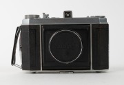 KODAK: German-made Suprema horizontal-folding camera [#210 966 K], c. 1939, with Xenar 80mm f3.5 lens [#1226757] and Compur-Rapid shutter. One of only approximately 1800 to be produced. - 2
