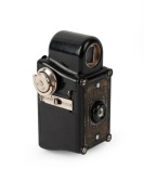 CORONET: Midget subminiature Bakelite box&nbsp;camera,&nbsp;c. 1935, in black with Taylor Hobson Meniscus lens.
