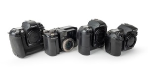 FUJIFILM: Four c. 2000s digital SLR cameras - one Fujifilm S5 Pro body [#73A00449] with body cap, one FinePix S2 Pro body [#22A00053] with body cap, one FinePix S3 Pro body [#53L51001] with body cap, and one Fujix DS-300 [#7201055]. (4 cameras)