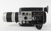 CANON: Circa 1973 Canon Auto Zoom 1014 Electronic 8mm movie camera [#160388], with Macro 7-70mm f1.4 lens [#164940], together with lens cap, wrist strap, remote switch, and leather case. - 2